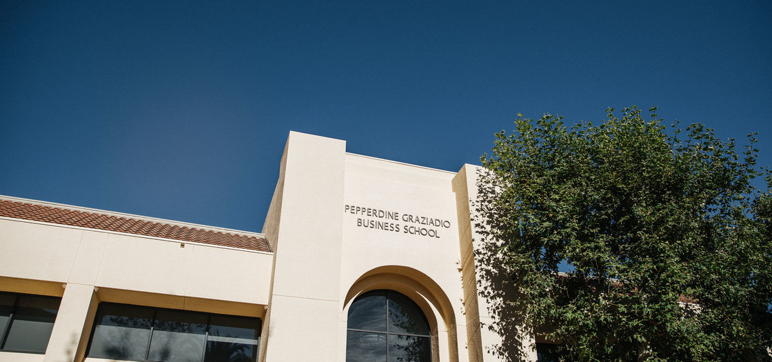 Image of Pepperdine Graziadio Business School building with blue Malibu sky